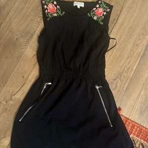 Shorter length, nice quality black dress